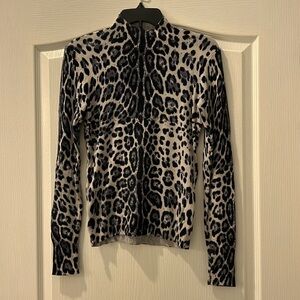 Women’s leopard print turtleneck